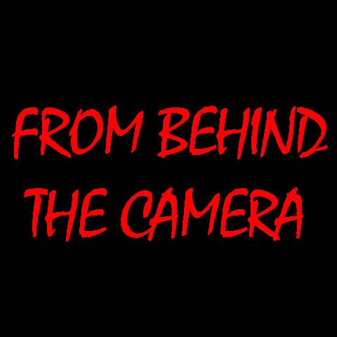 From behind the camera